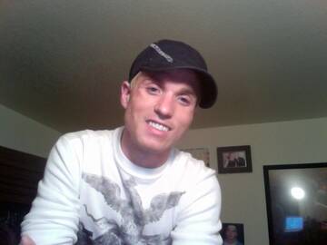 Smiling.